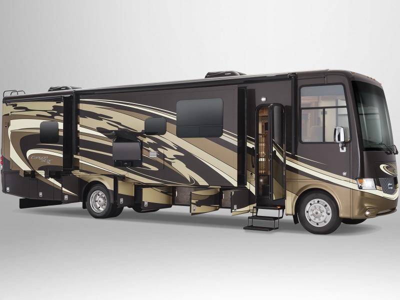 A Newmar® Canyon Star® motorhome with all of its compartments opened.